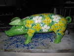 Ferkel mit Frühlingsblumen