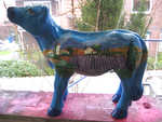 kleines Kalb mit Toscana-Landschaft